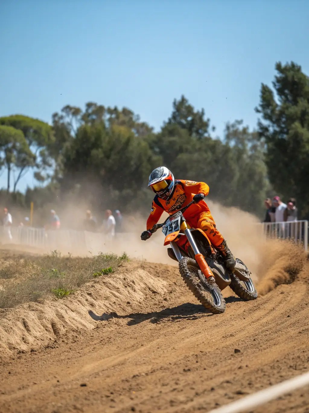 A team of young riders is participating in a local motocross competition, wearing Bourges Racing Team jerseys, demonstrating teamwork, sportsmanship, and competitive spirit, showcasing the team's involvement in motorsports events.